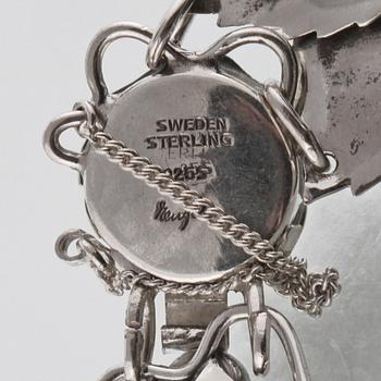 ARMBAND, silver samt cabocholslipade malakit, Gertrud Engel för A Michelsen, Stockholm, 1953. Vikt 38,6 gram.