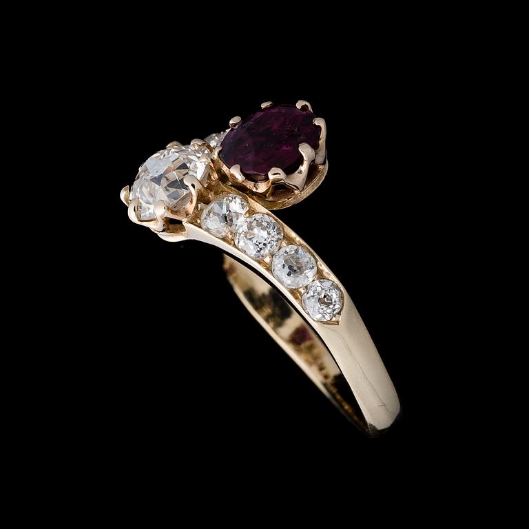 A RING, facetted ruby, brilliant cut diamond, 14K (56) gold.