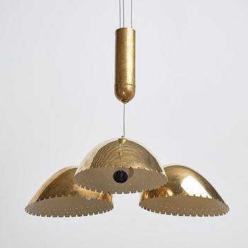 A brass ceiling light attributed to Carl-Axel Acking, Böhlmarks, Sweden 1940's.