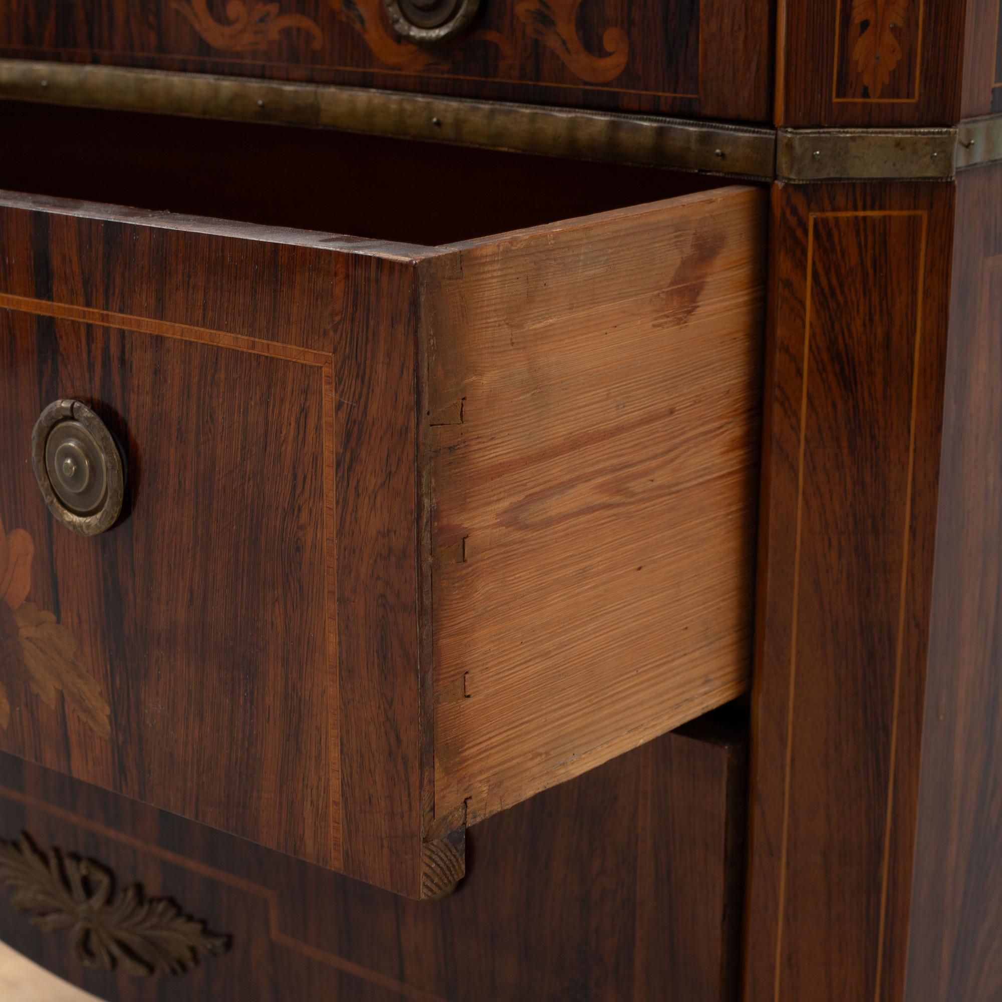 A Gustavian style chest of drawers, early 20th century.