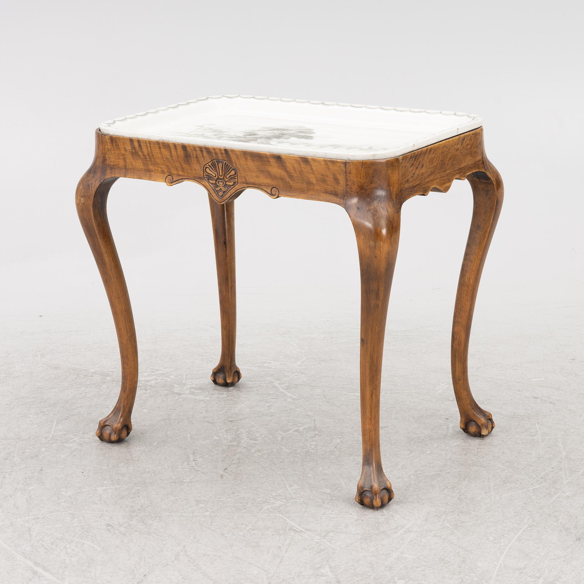 Josef Ekberg, a Rococo style tea table, Gustavsberg, first half of the 20th Century.