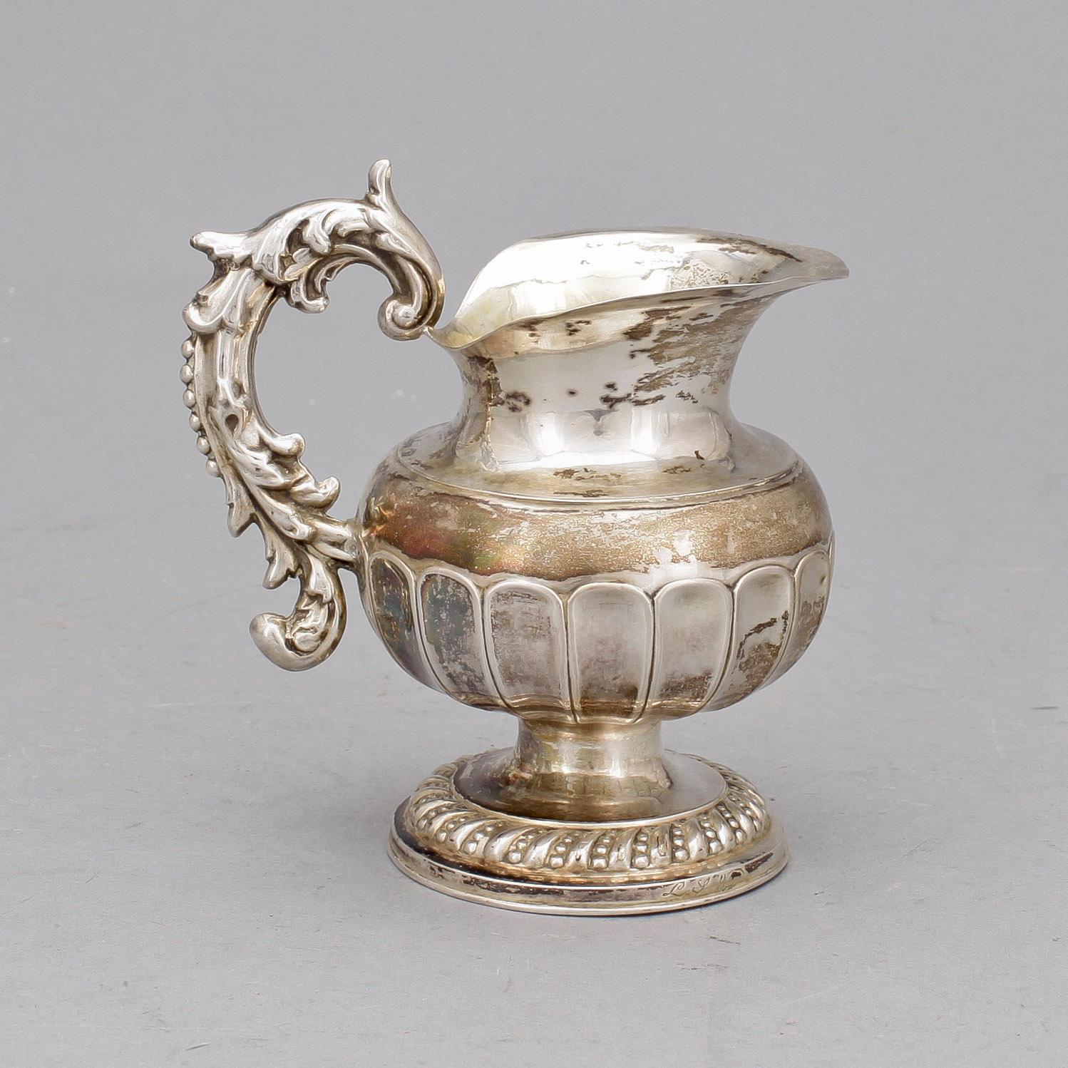 GRÄDDKANNA, silver, senempire, Gustaf Theodor Folcker, Stockholm, 1839. Vikt ca 138 gram.