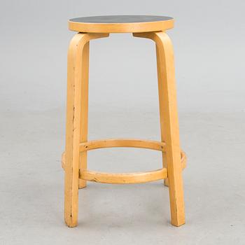 A Mid Century Model 64 Bar Stool by Artek.