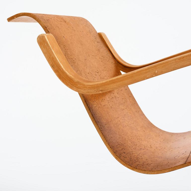 Alvar Aalto, a model 31 burled birch armchair, produced by O.y Huonekalu-ja Rakennustyötehdas, Finland or Aalto Design Hedemora.