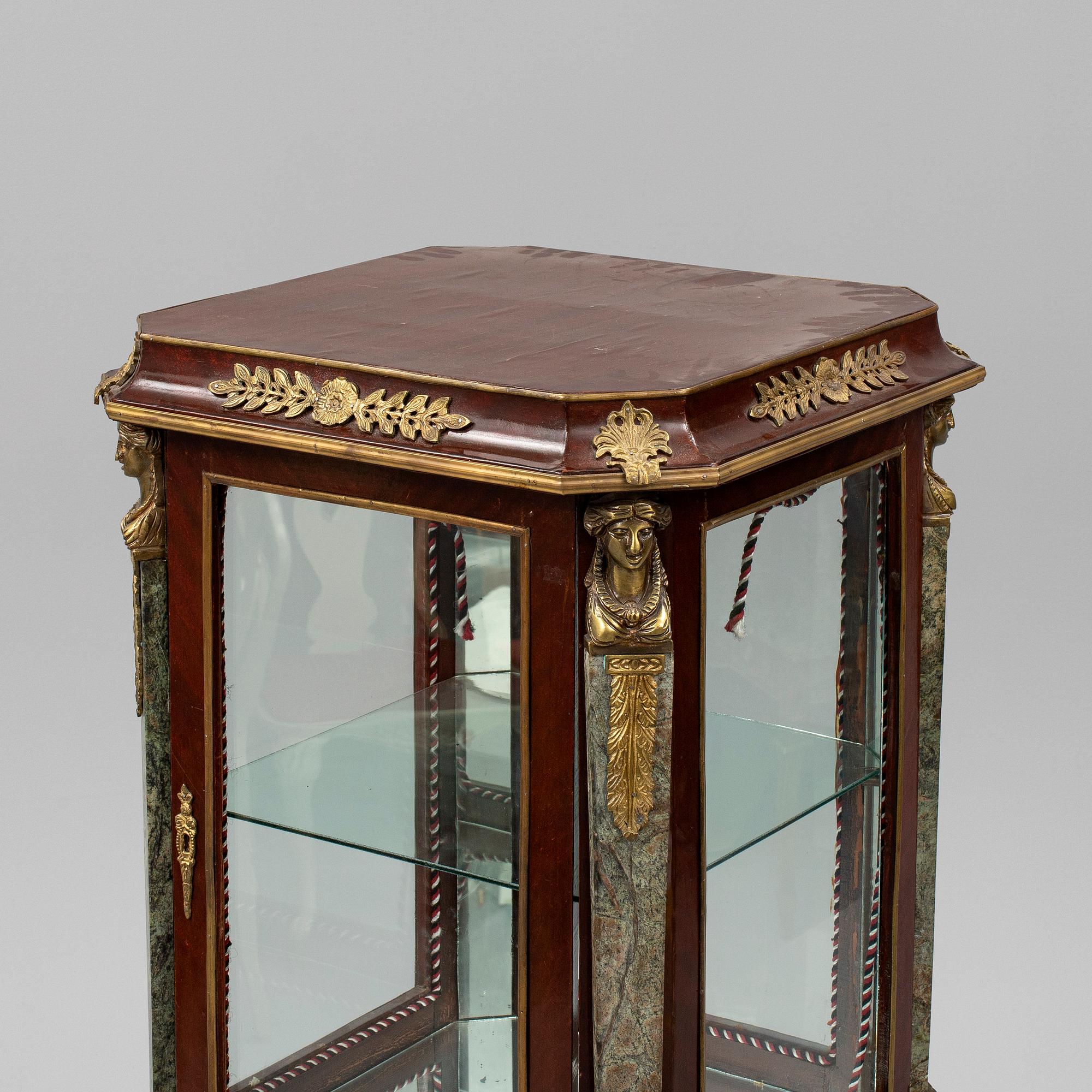 An Empire style cabinet, mid 20th Century.