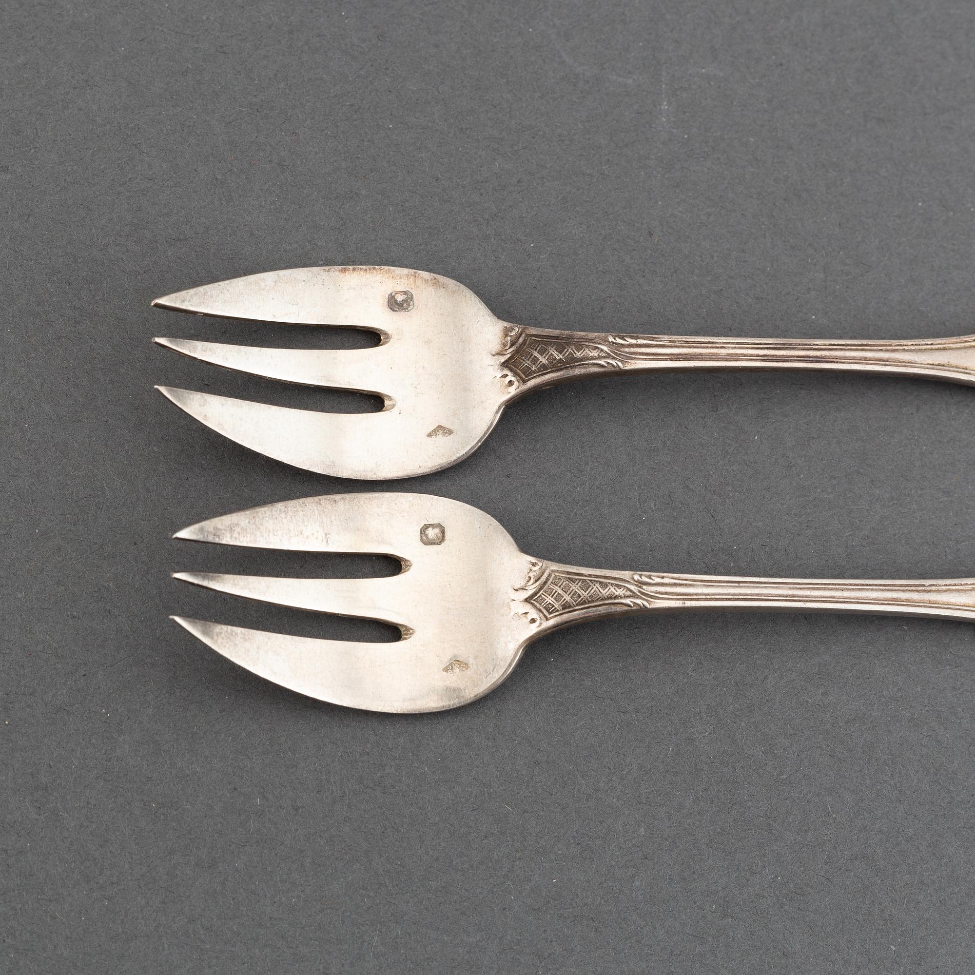 A set of twelve French silver oister-forks, after 1838.
