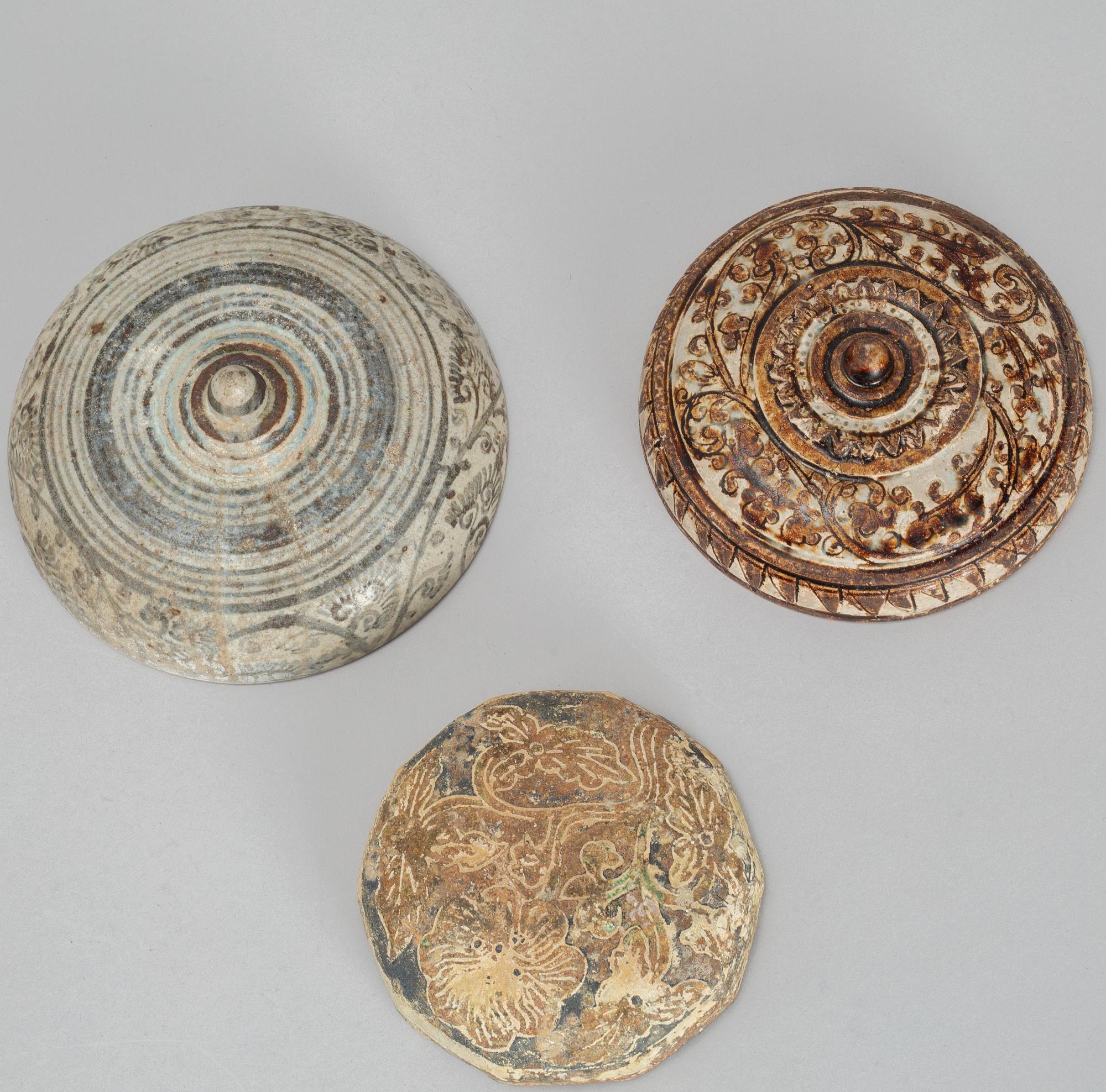 A group of three ceramic covers, including Thailand, Sawankhalok, 16th/17th century.