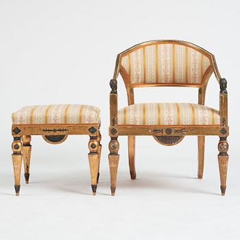 A Late gustavian armchair and stool in the manner of C G Gjörwll (1766-1837).