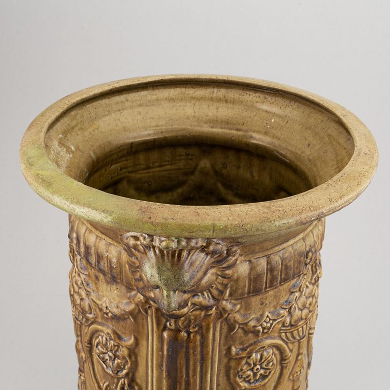A large ceramic umbrella stand, circa 1900.