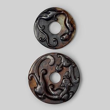 622. Two carved archaistic bi-discs, presumably Ming dynasty (1368-1644).