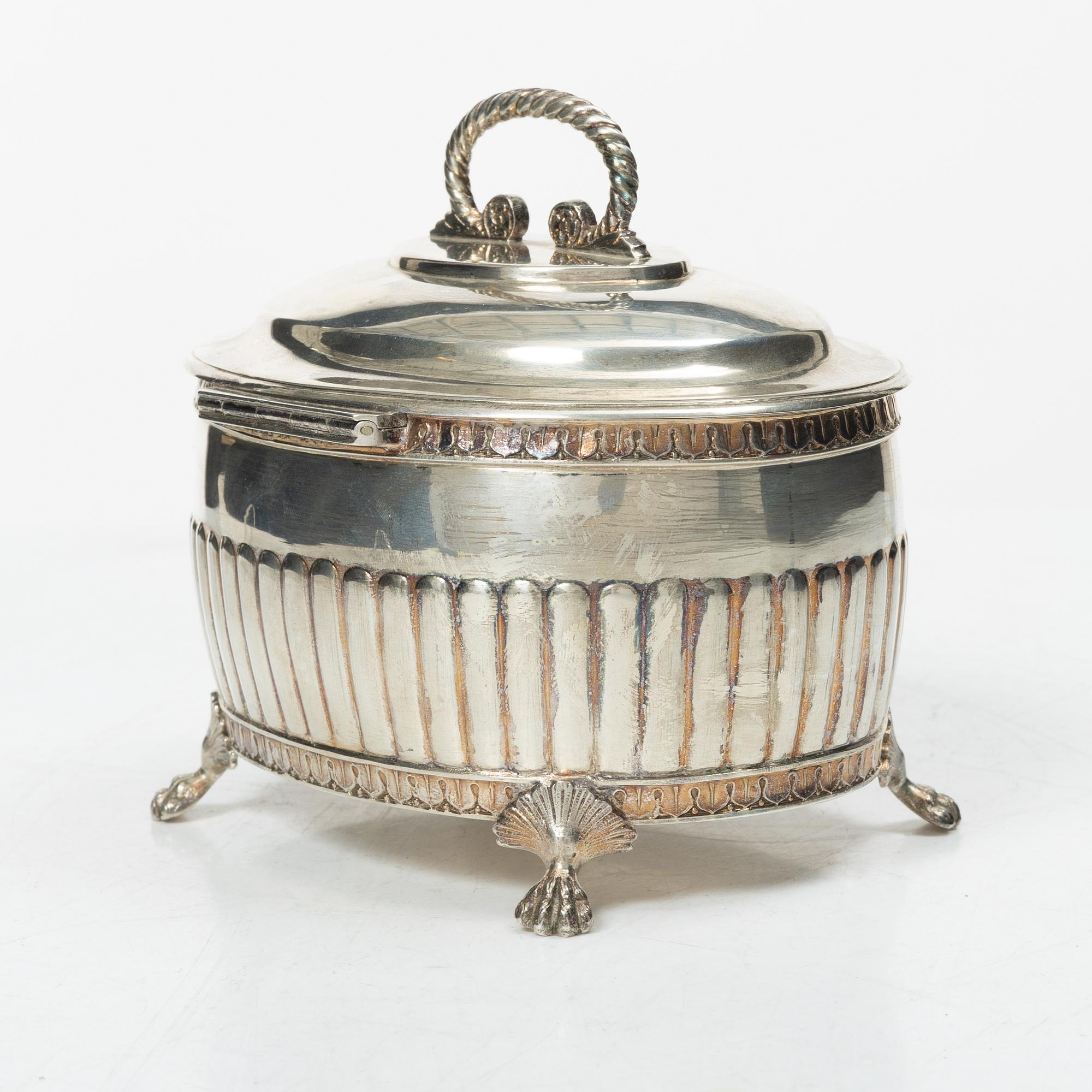 A Swedish silver coffee pot, cream jug and sugar box, Gustavian style, mark of AG Dufva, Stockholm 1911-1912.