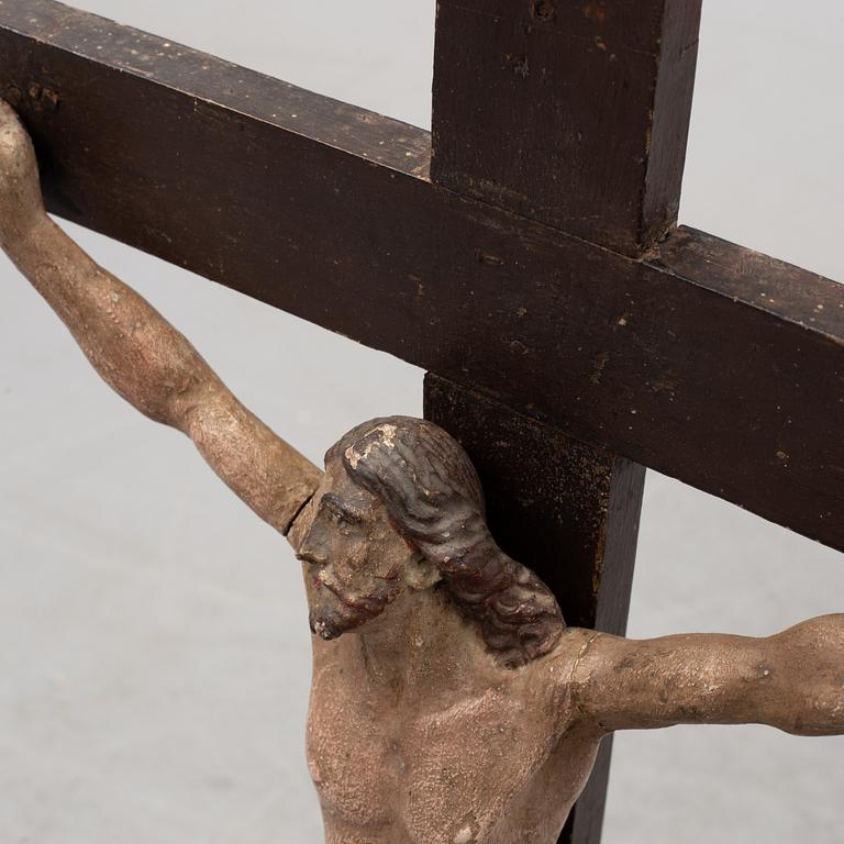 A 17TH CENTURY WOODEN CRUCIFIX, baroque.