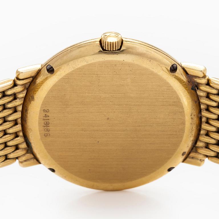 IWC (International Watch Co.), 31 mm, 18K gold, quartz.