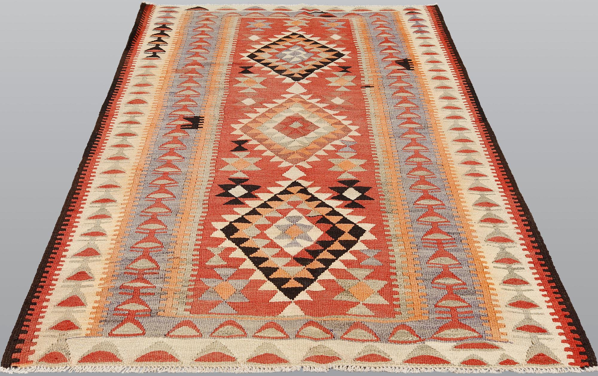 A Nomad Kelim Kord carpet, 230 x 152 cm.