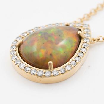 Necklace in 18K gold with a drop-shaped opal and octagon-cut diamonds.