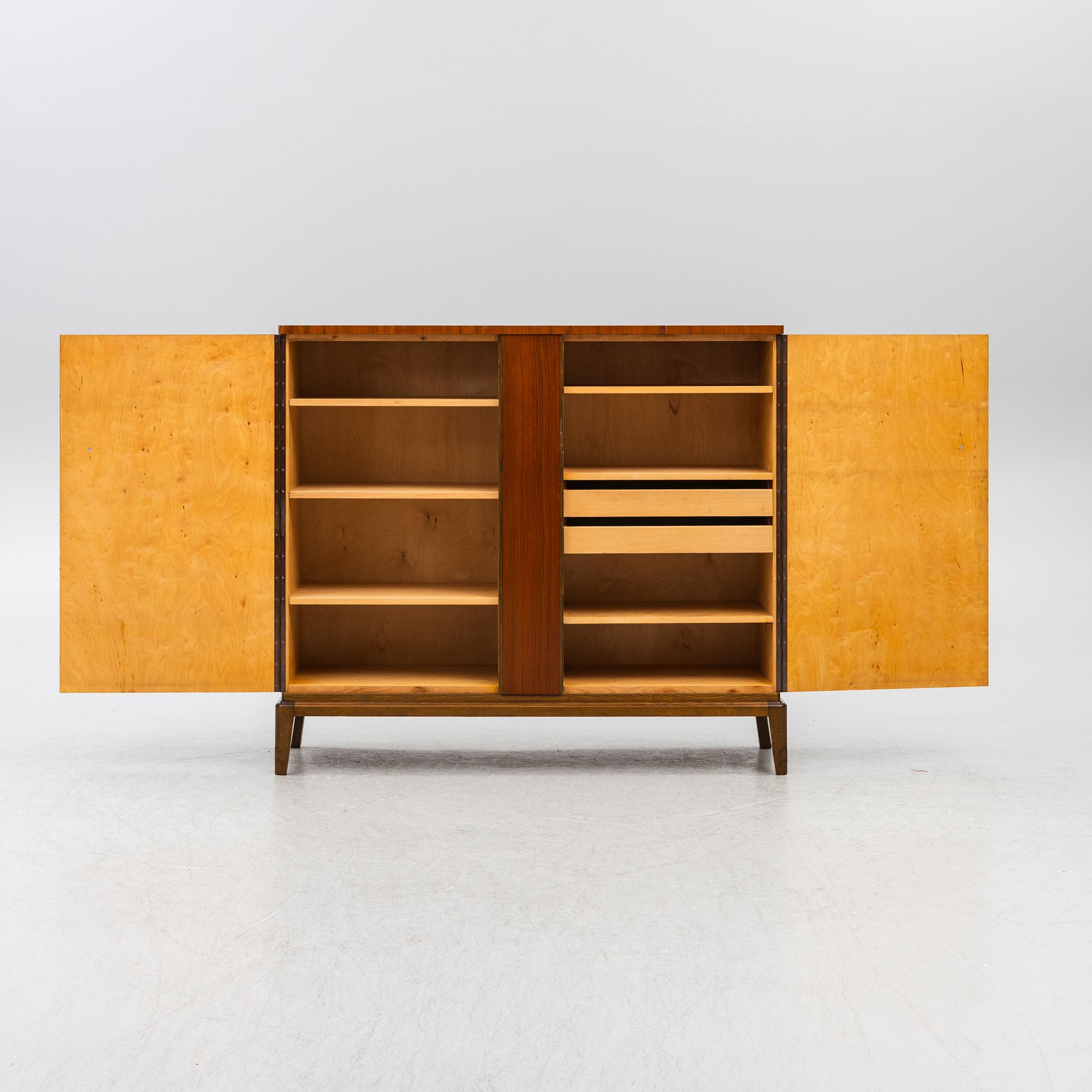 A Swedish Modern cabinet, mid20th century.