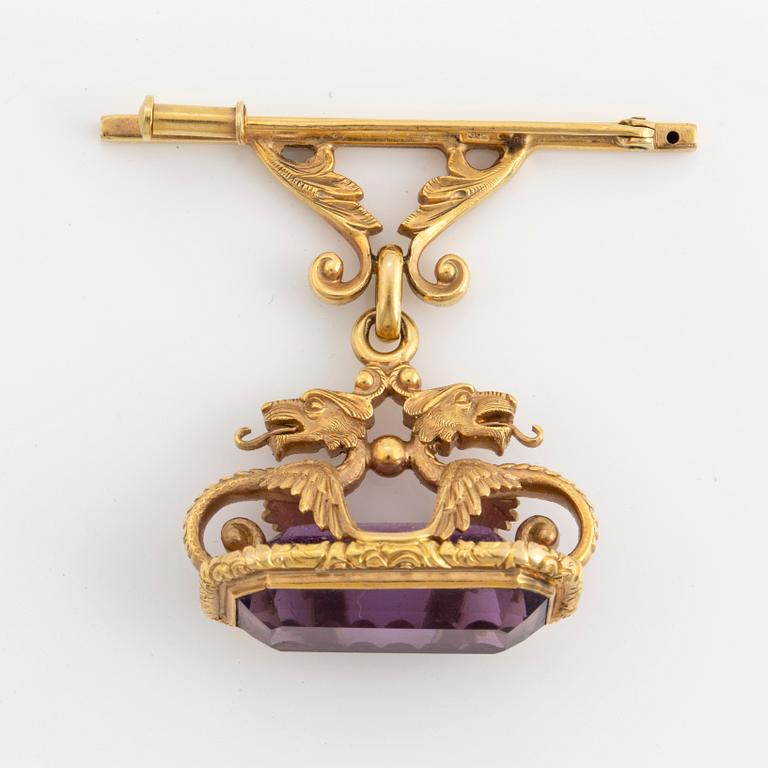 Amethyst brooch.