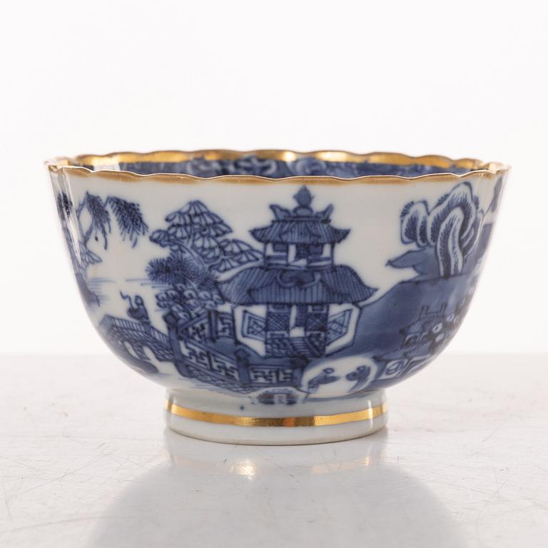 A group  of three serving dishes, a serving bowl, a cup, and seven plates, porcelain, including China 18th century.