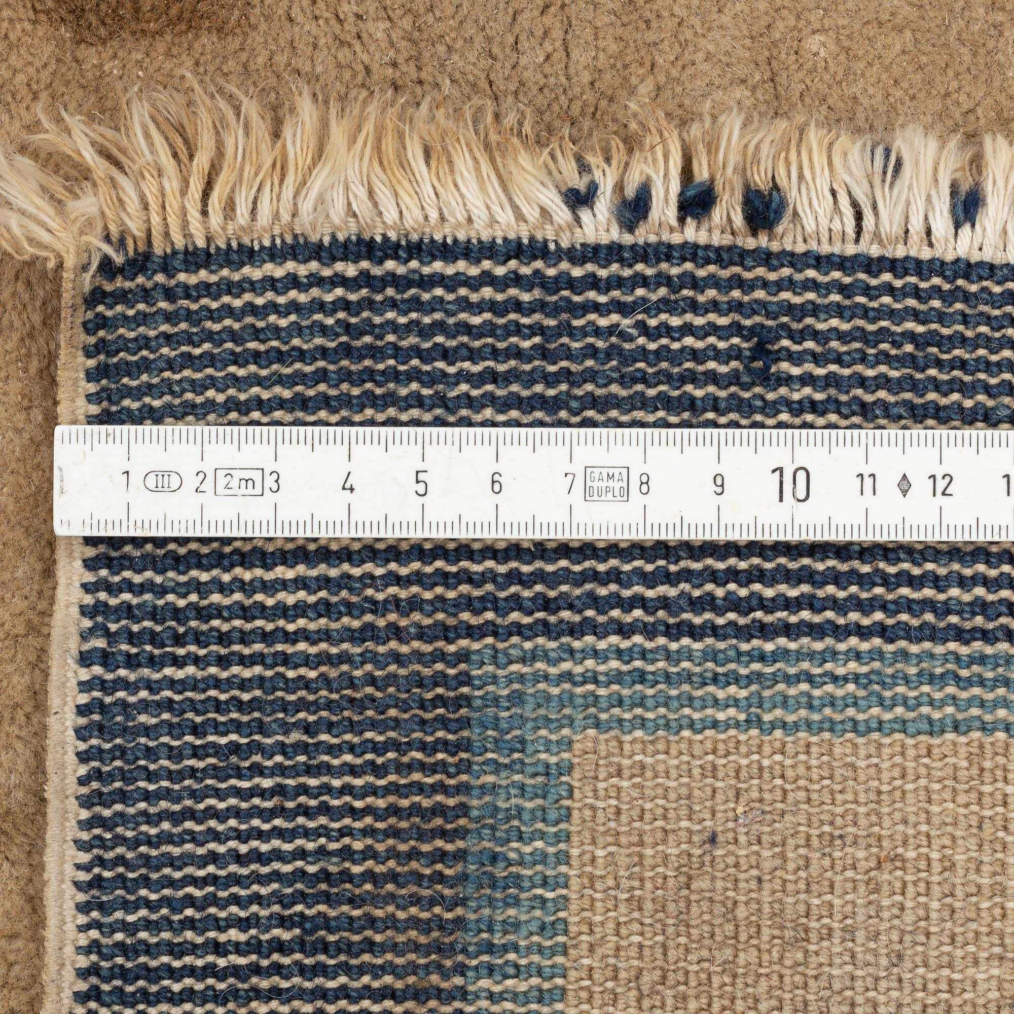 A Chinese Antique Finish rug, c. 278 x 186 cm.