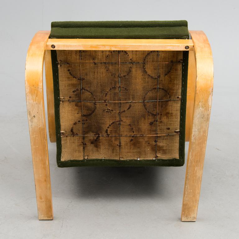 A Mid-20th Century open Armchair model 36/401 for Artek, Finland.