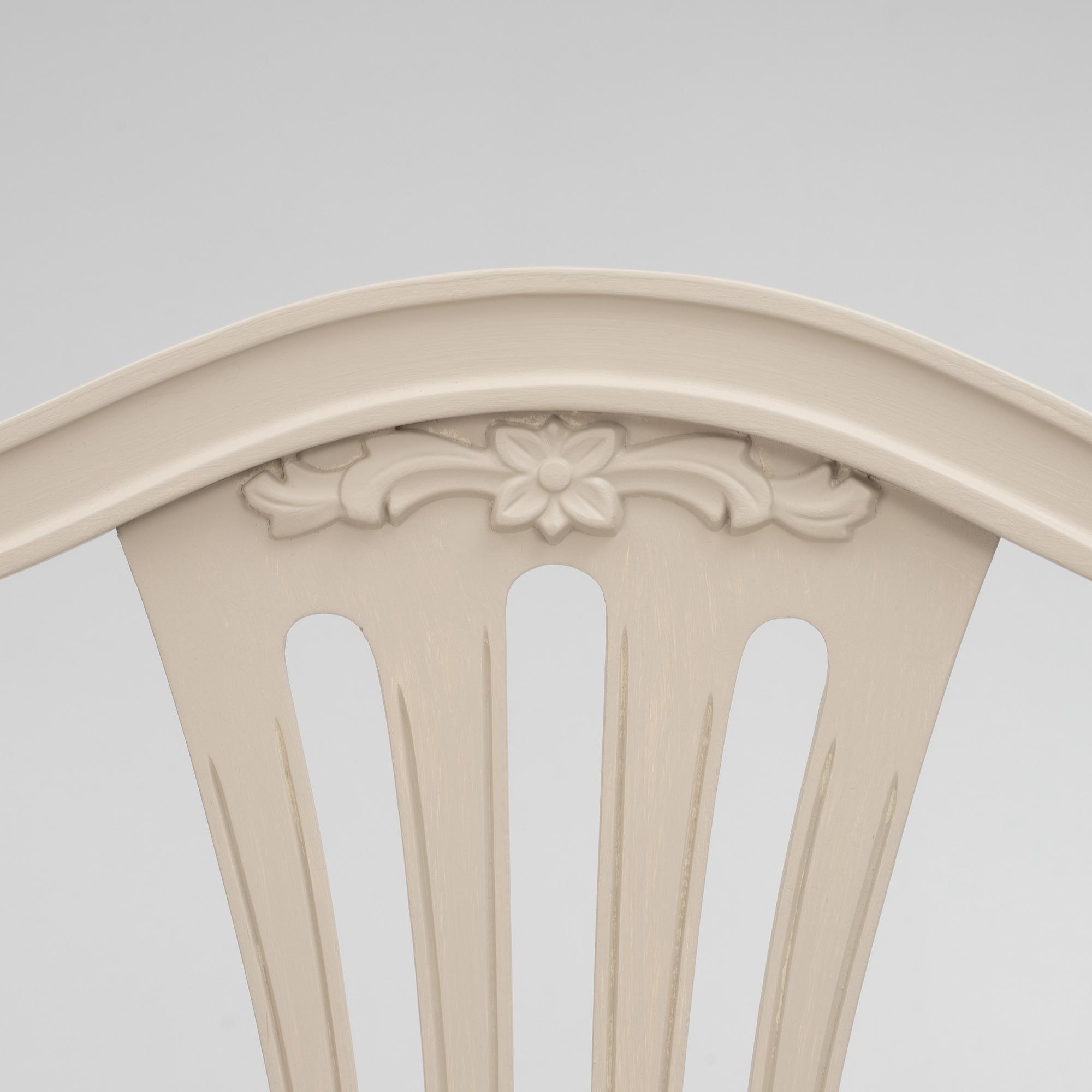A Gustavian Style Dining Table and 10 Chairs, second half of the 20th Century.
