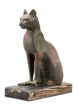 592. A bronze cat statuette, Egypt, possibly 22-30 Dynasty, 945-332 BC.