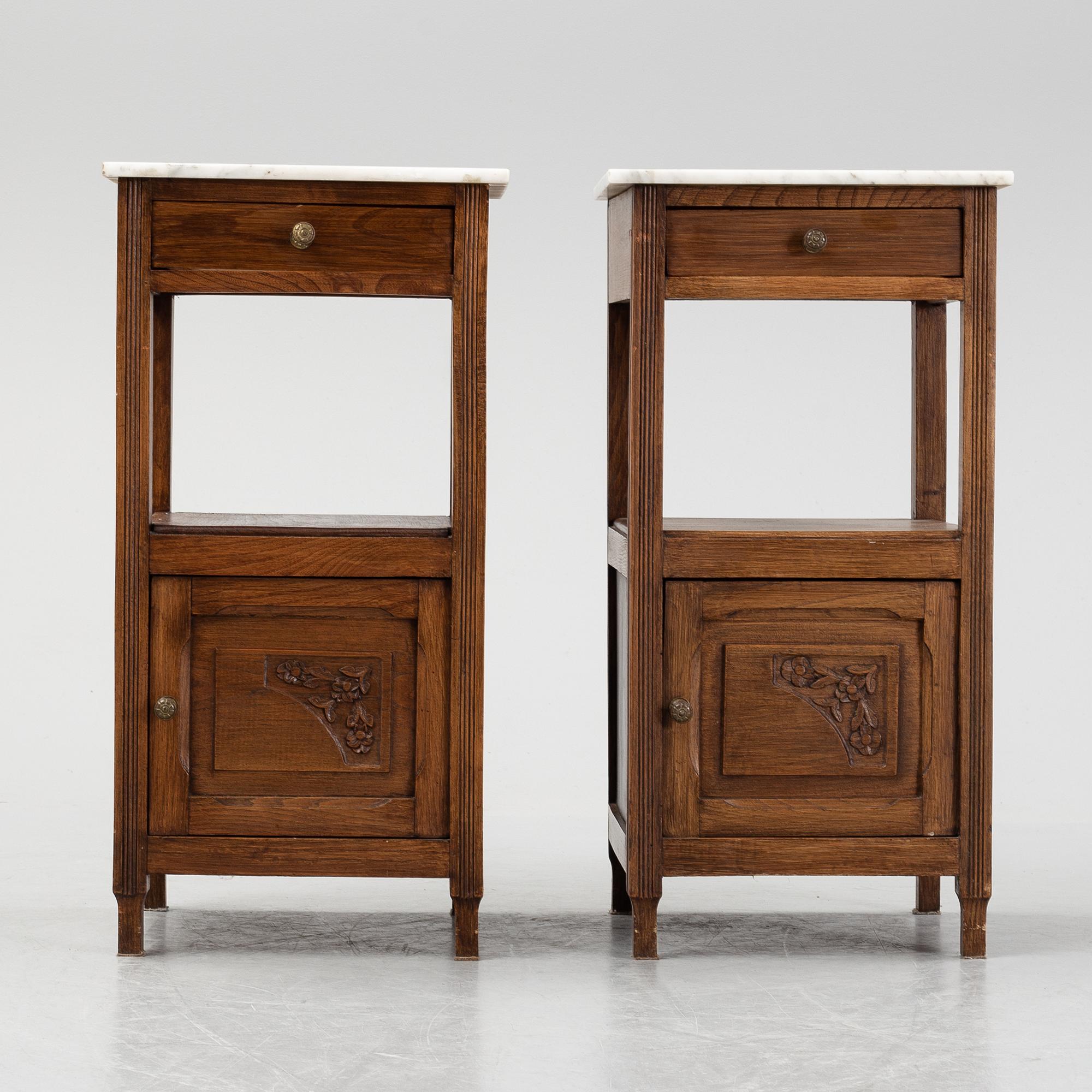 A pair of early 20th Century bedside tables.