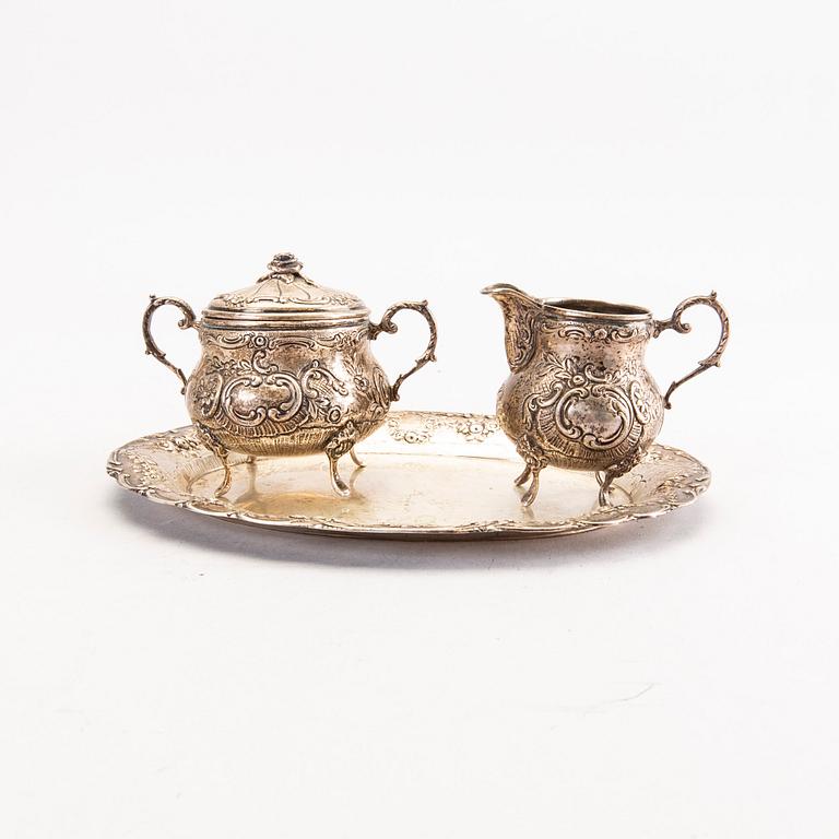 A Swedish 20th century set of three pcs of creamer and sugar-bowl, mark of JL Hultman Stockholm 1954, total weight 422 g.