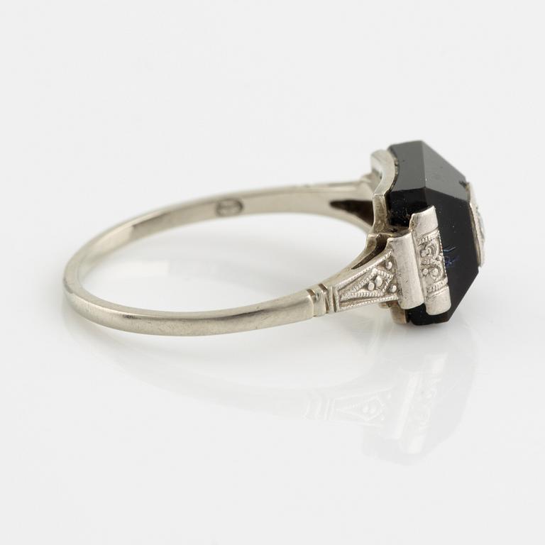 18K white gold, onyx with round brilliant cut diamond ring.