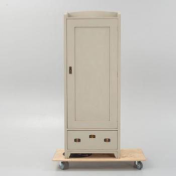 A painted cabinet, around the year 1900.