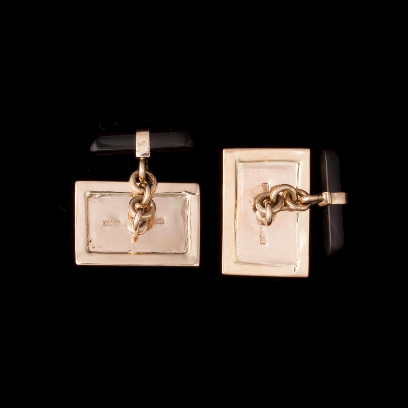 MANSCHETTKNAPPAR, 14K guld, emaljerade, med diamanter 2 x 0,02 ct. Vikt 8,7 g.