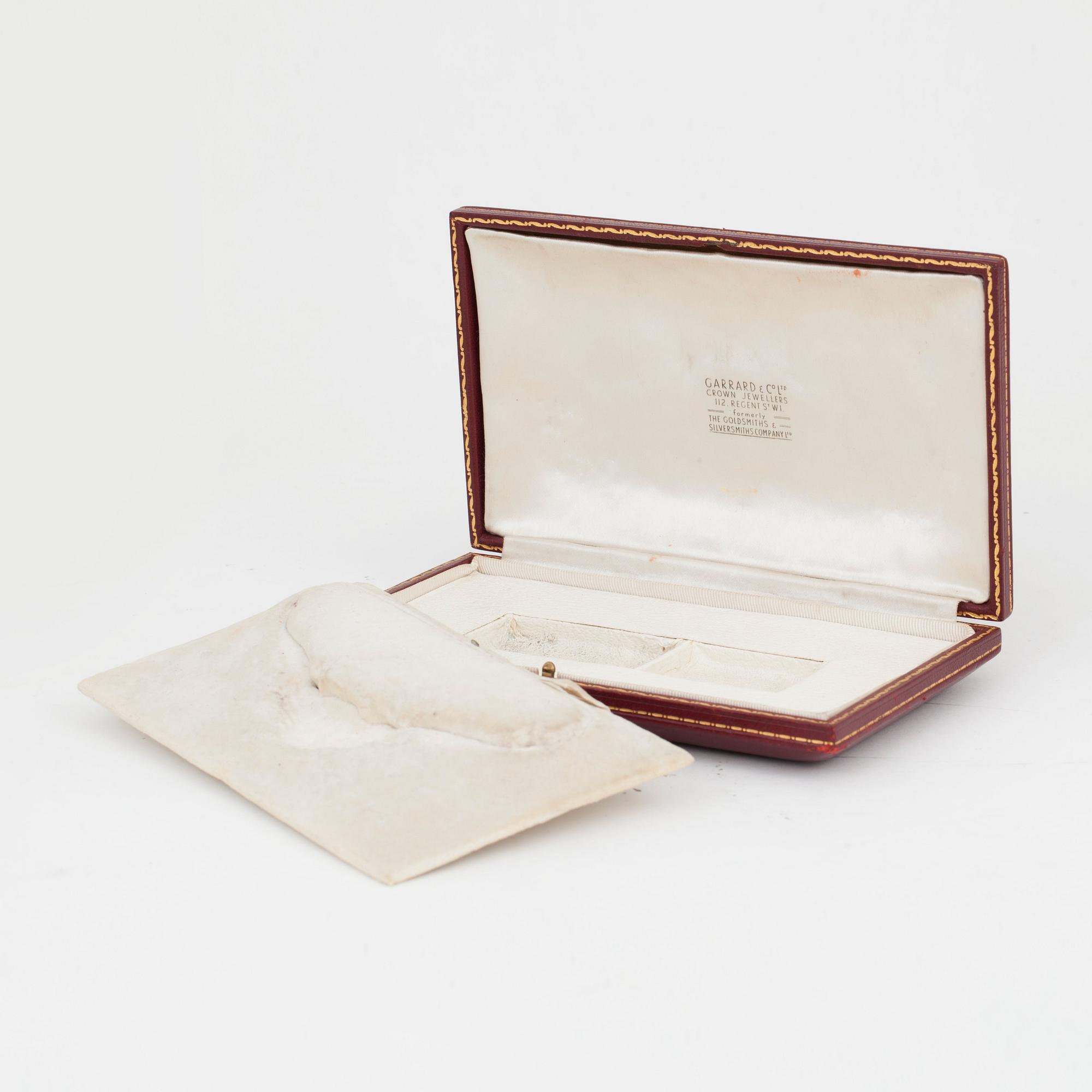 A diamond and sapphire set, probably Garrard & co. The set can be worn as a necklace, earrings, double clip or brooch.