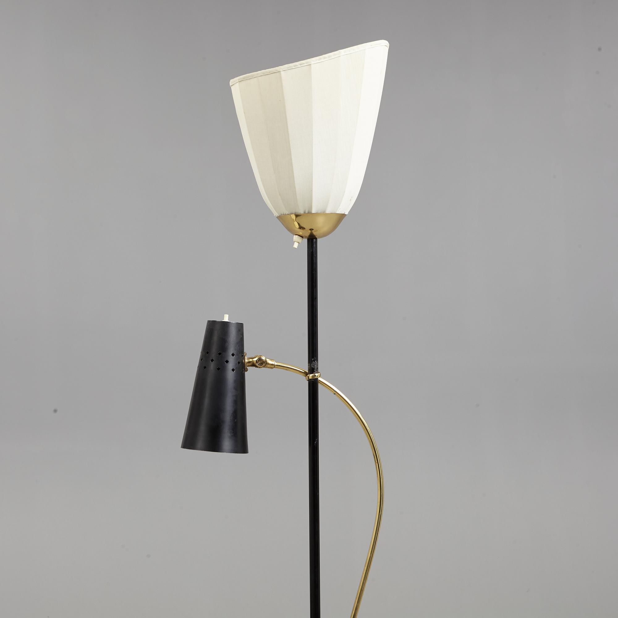 A Swedish Modern brass and black lacquered floor lamp, 1950's.