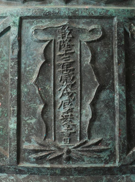 A large dated bronze Buddhist temple bell, Qing dynasty (1644-1912).