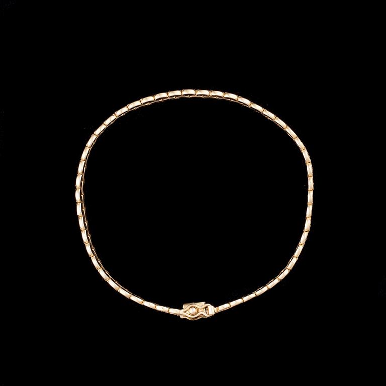 ARMKED, 14K guld. Kellomiehet 1976. Vikt ca 11,0 g.