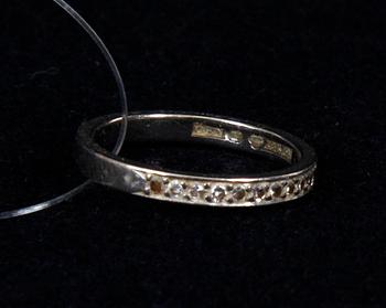 ALLIANSRING, 18K vitguld och briljanter.