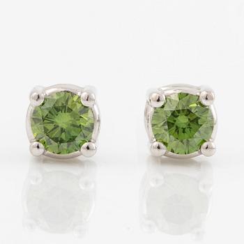 Earrings 18K white gold with colour-treated green brilliant-cut diamonds.