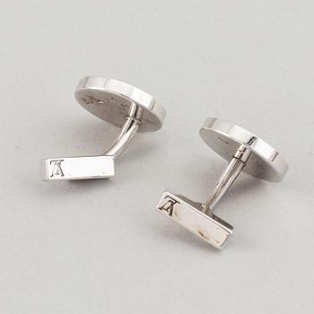 Louis Vuitton and Giorgio Armani, two pairs of cufflinks.