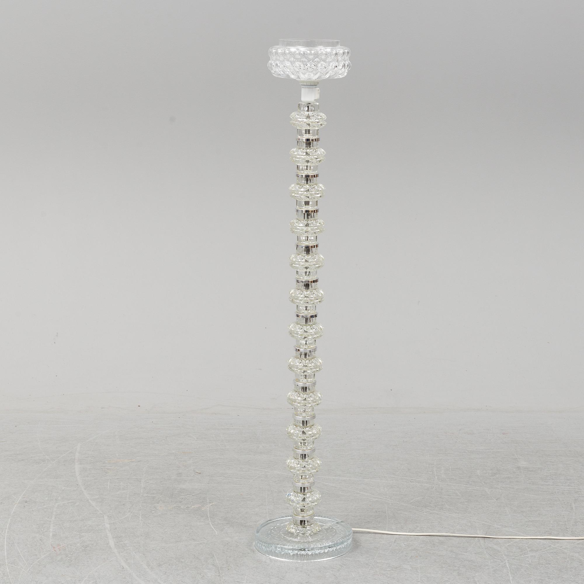 A glass floor lamp.