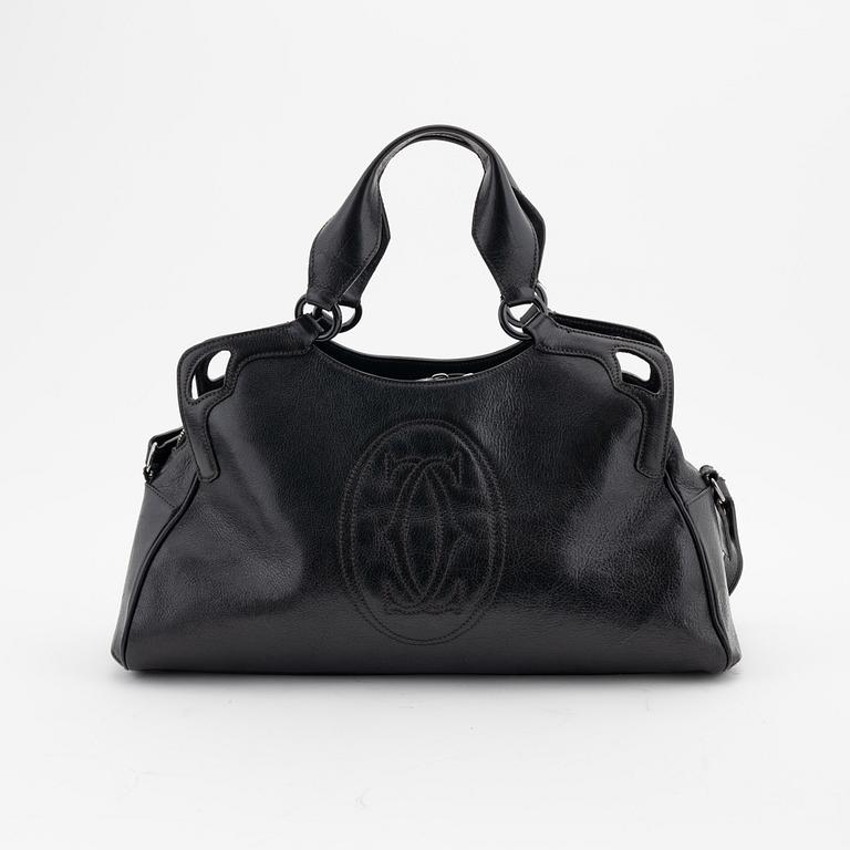 Cartier, a black leather handbag.