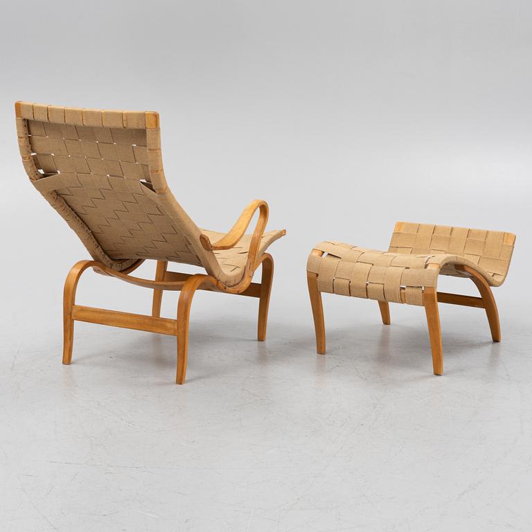 Bruno Mathsson, a 'Pernilla' lounge chair and foot stool from Firma Karl Mathsson, 1940's/50's.