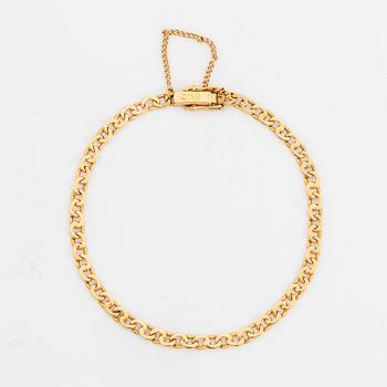 18K gold bracelet.