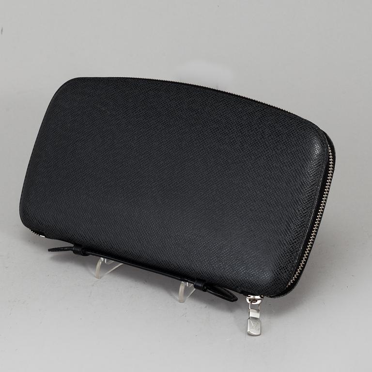 LOUIS VUITTON, an 'Atoll Ardiose' Taiga leather trave organizer, 2015.