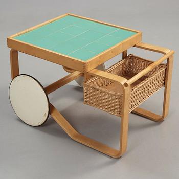 An Alvar Aalto birch serving trolley, made on license by Aalto design Hedemora on behalf of Artek, Sweden 1946-56.