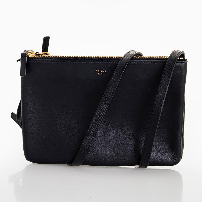 Céline, a black leather 'Trio Small' bag.