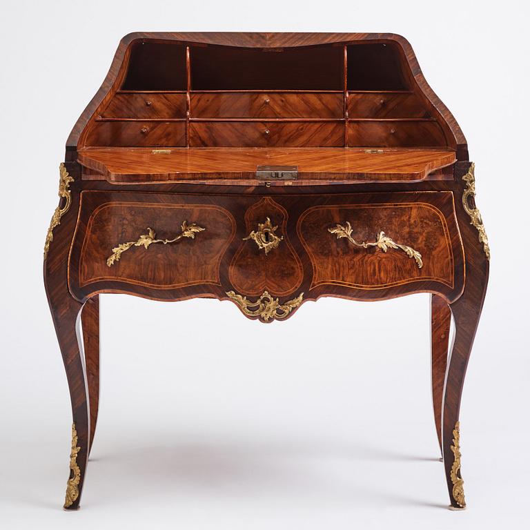 A rosewood, walnut, and gilt brass-mounted rococo secretaire by J. H. Reimers (master in Stockholm 1754-73).