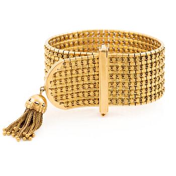 558A. A bracelet 18K gold with a tassel, second half of the 20th century.
