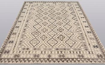 A Kelim carpet, 295 x 200 cm.