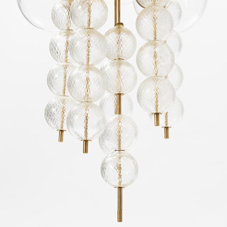 A brass and glass ceiling lamp, Italy, second half of the 20th century.