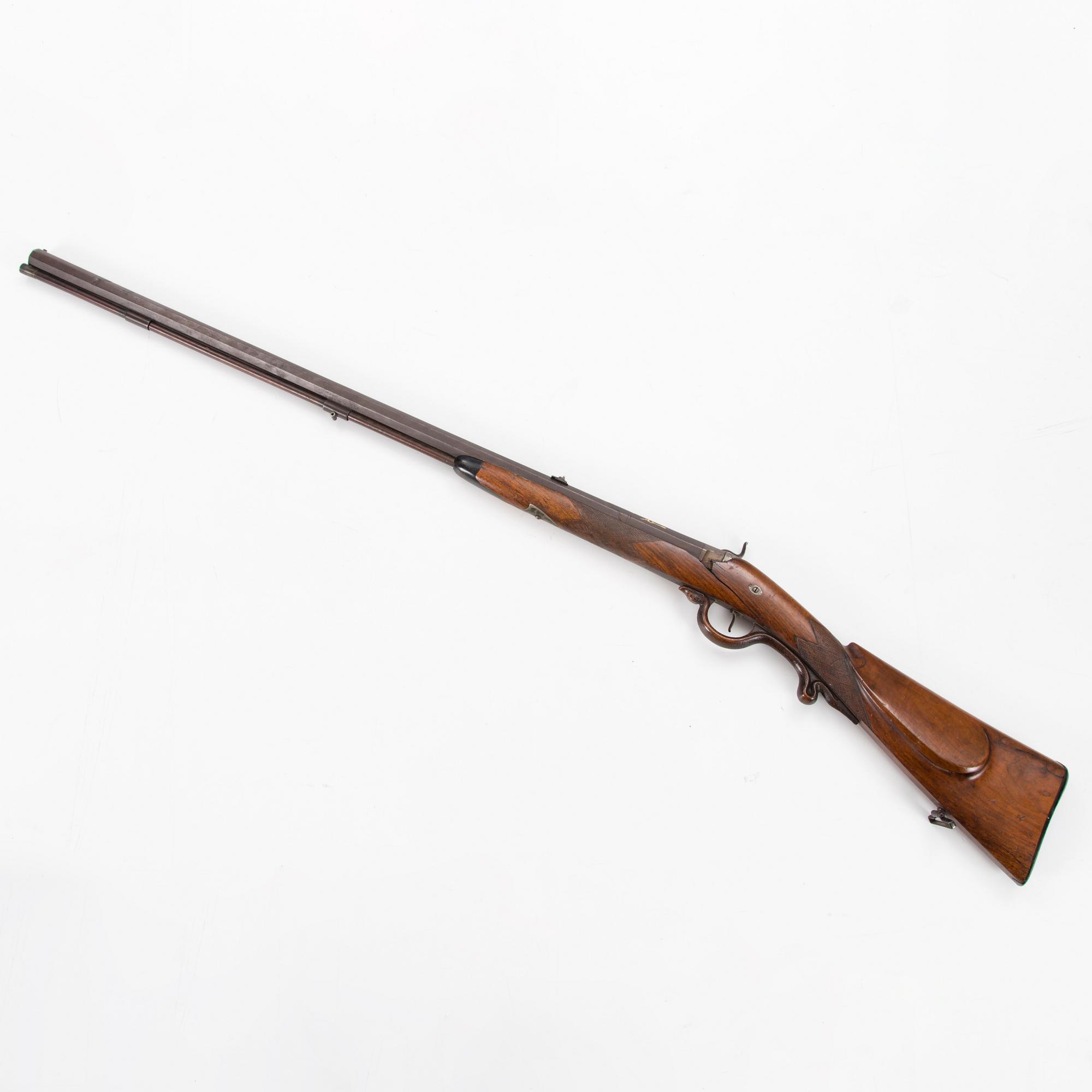 A mid 19th Century percussion rifle.